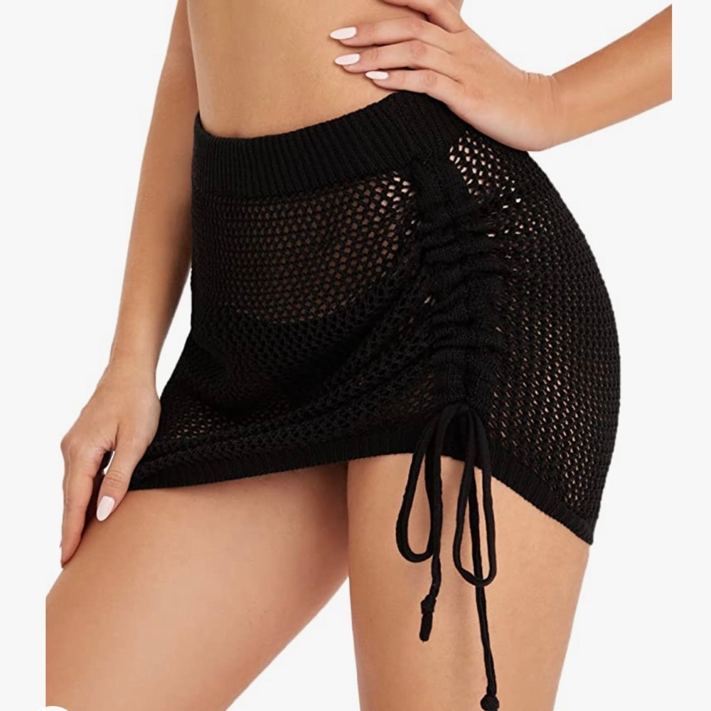 Woman’s knit cover-up / see through skirt
